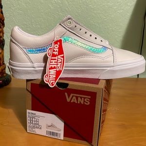 Brand new, white leather Vans.
